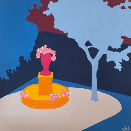 Red garden urn with blue tree