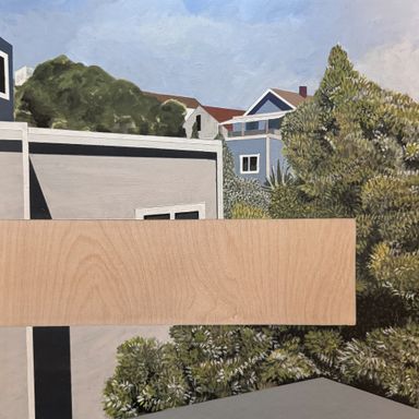 View of residential buildings and trees, with a void in the middle.