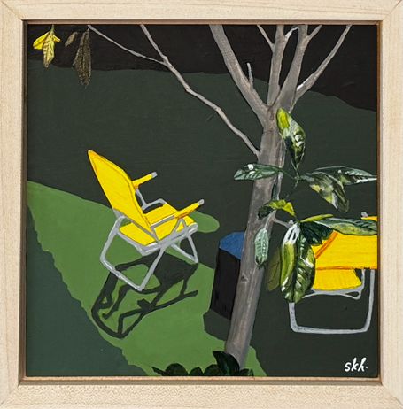 Small view of neighbor's lawn chairs